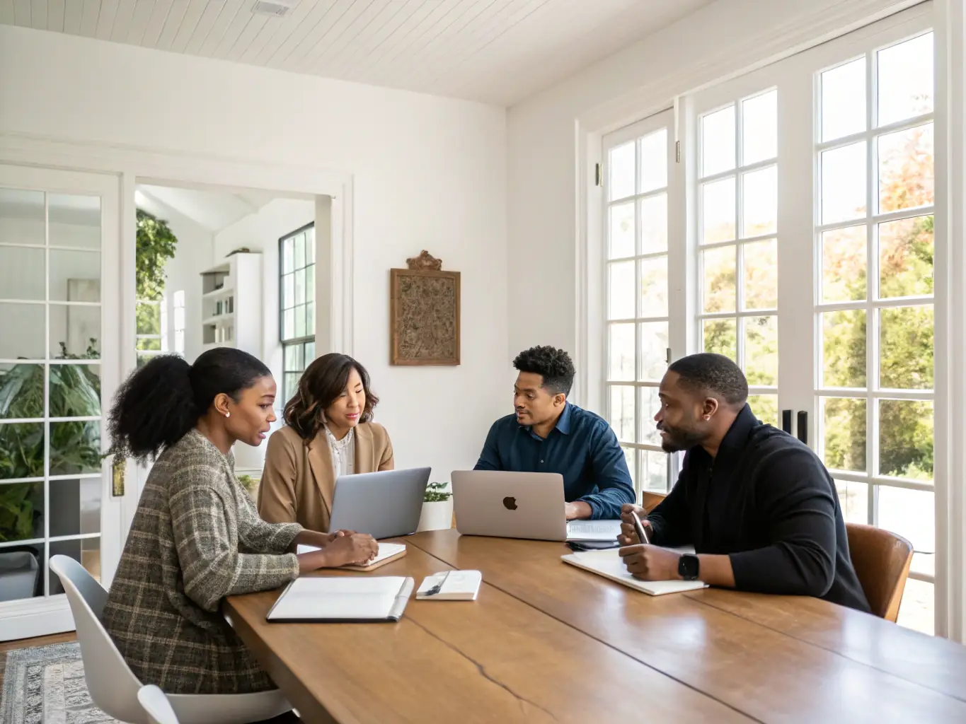 An image of a diverse group of young professionals collaborating and using UPLY on their mobile devices, highlighting the platform's accessibility and collaborative features.